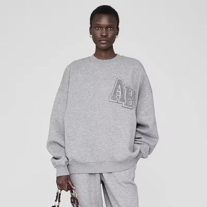 Damen Oversize Sweatshirt Rundhals Grau mit „PARIS“-Schriftzug