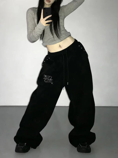Schwarze weite Freizeithose für Damen mit Strass-Details und Kordelzug