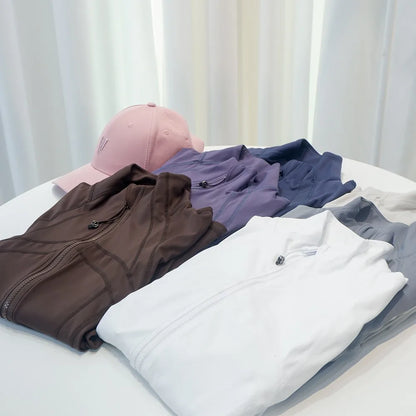 Damen Sportjacke mit Stehkragen, Reißverschluss und Daumenlöchern – Grau