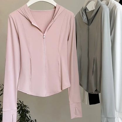 Damen Sportjacke mit Kapuze und Reißverschluss, tailliert, Daumenlöchern, langärmelig, Rosa
