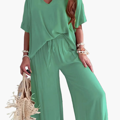 Damen Eleganter Jumpsuit mit weitem Bein und V-Ausschnitt – Perfekt für Freizeit und Partys