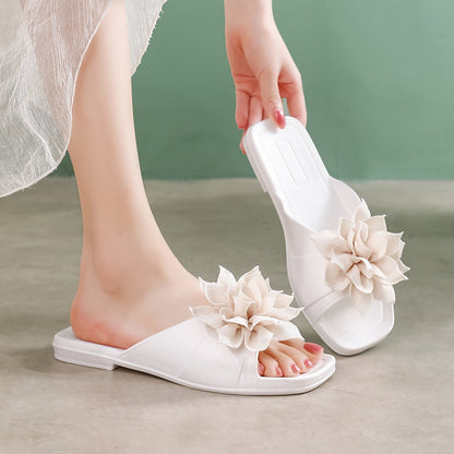 Damen Slipper Sandalen mit Blumenapplikation – Verspielte Sommerschuhe für Freizeit und Alltag