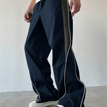 Herren Streetwear Weite Jogginghose mit Kontraststreifen und sportlichem Look