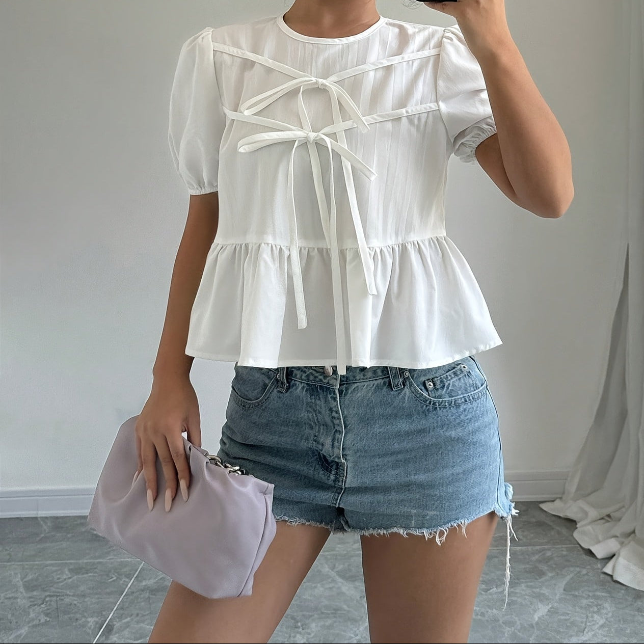 Damen Peplum-Bluse mit Puffärmeln und Schleifen – Verspielter, femininer Look für Freizeit und Alltag
