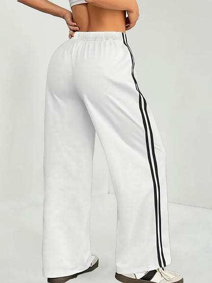 Damen Weite Sporthose mit Streifen und Retro-Look