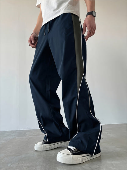 Herren Streetwear Weite Jogginghose mit Kontraststreifen und sportlichem Look