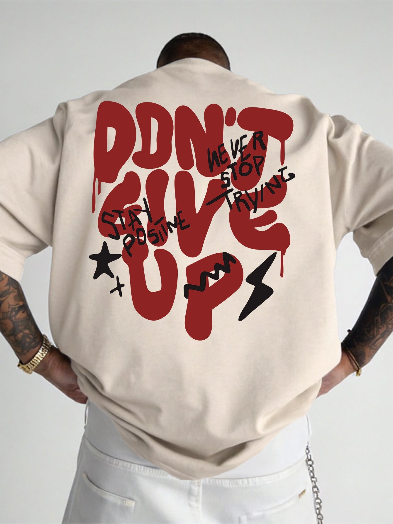 Herren Oversize Streetwear T-Shirt mit Motivdruck 'Don't Give Up' – Urban Style für Motivation und positive Vibes