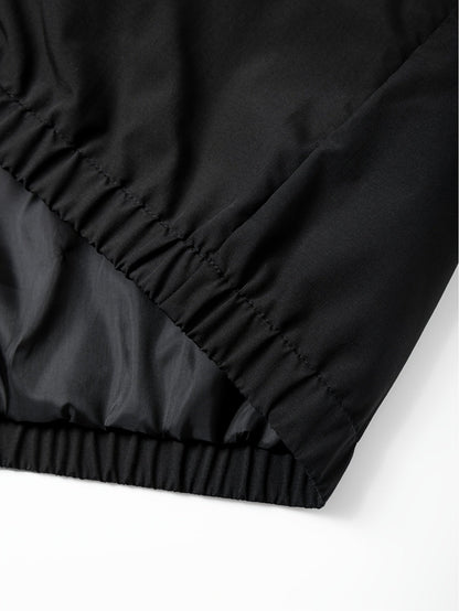 Schwarze Kapuzenjacke mit Halbreißverschluss und Bauchtasche