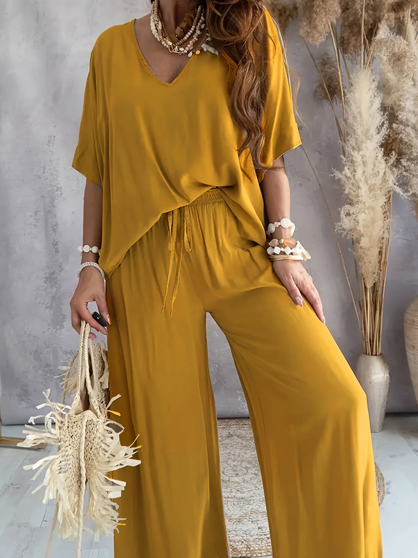 Damen Eleganter Jumpsuit mit weitem Bein und V-Ausschnitt – Perfekt für Freizeit und Partys