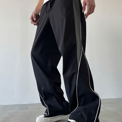 Herren Streetwear Weite Jogginghose mit Kontraststreifen und sportlichem Look