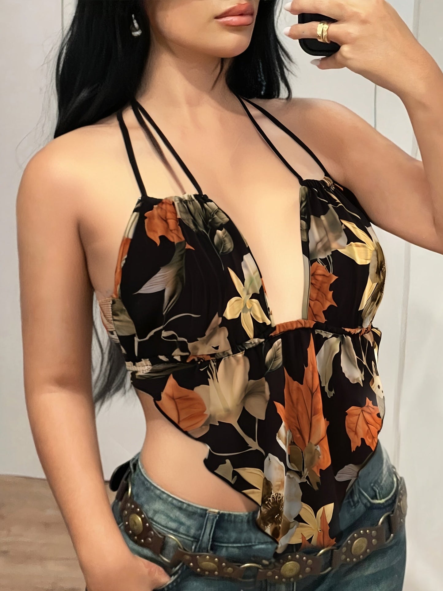 Damen Body mit Blumenmuster und tiefem Ausschnitt – Modischer Einteiler für trendige Freizeit-Looks