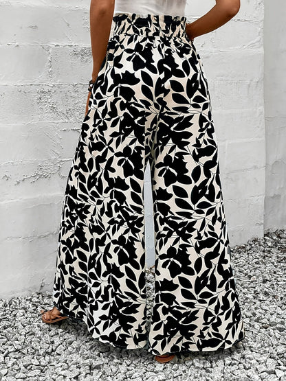 Damen Weitbeinige Paperbag-Hose mit Tropischem Blattmuster für Elegante Freizeit- und Urlaubslooks