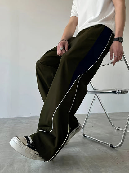 Herren Streetwear Weite Jogginghose mit Kontraststreifen und sportlichem Look