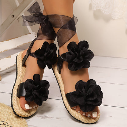 Damen Sandalen mit Blumenverzierung und Schleifen – Verspielte Sommerschuhe im femininen Stil