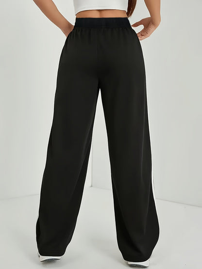 Damen Weite Sporthose mit Streifen und Retro-Look