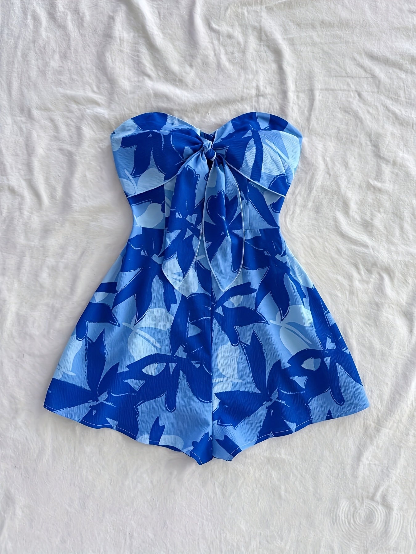 Damen Bandeau Jumpsuit mit Blumenmuster und Schleifendetail – Sommerlicher Einteiler für Urlaub und Freizeit