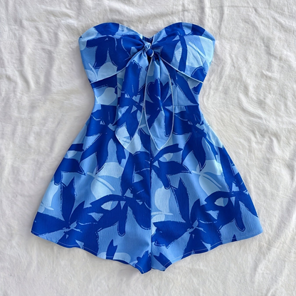 Damen Bandeau Jumpsuit mit Blumenmuster und Schleifendetail – Sommerlicher Einteiler für Urlaub und Freizeit