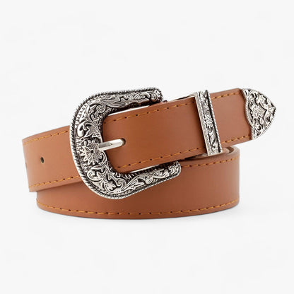Gürtel mit verzierter Silberschnalle im Western-Stil