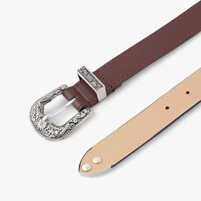 Gürtel mit verzierter Silberschnalle im Western-Stil